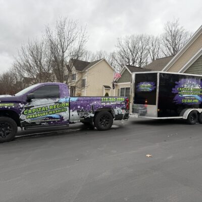Capital Region Pressure Washing truck in front of capital region home